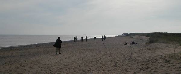 group walking along beach at Spurn
